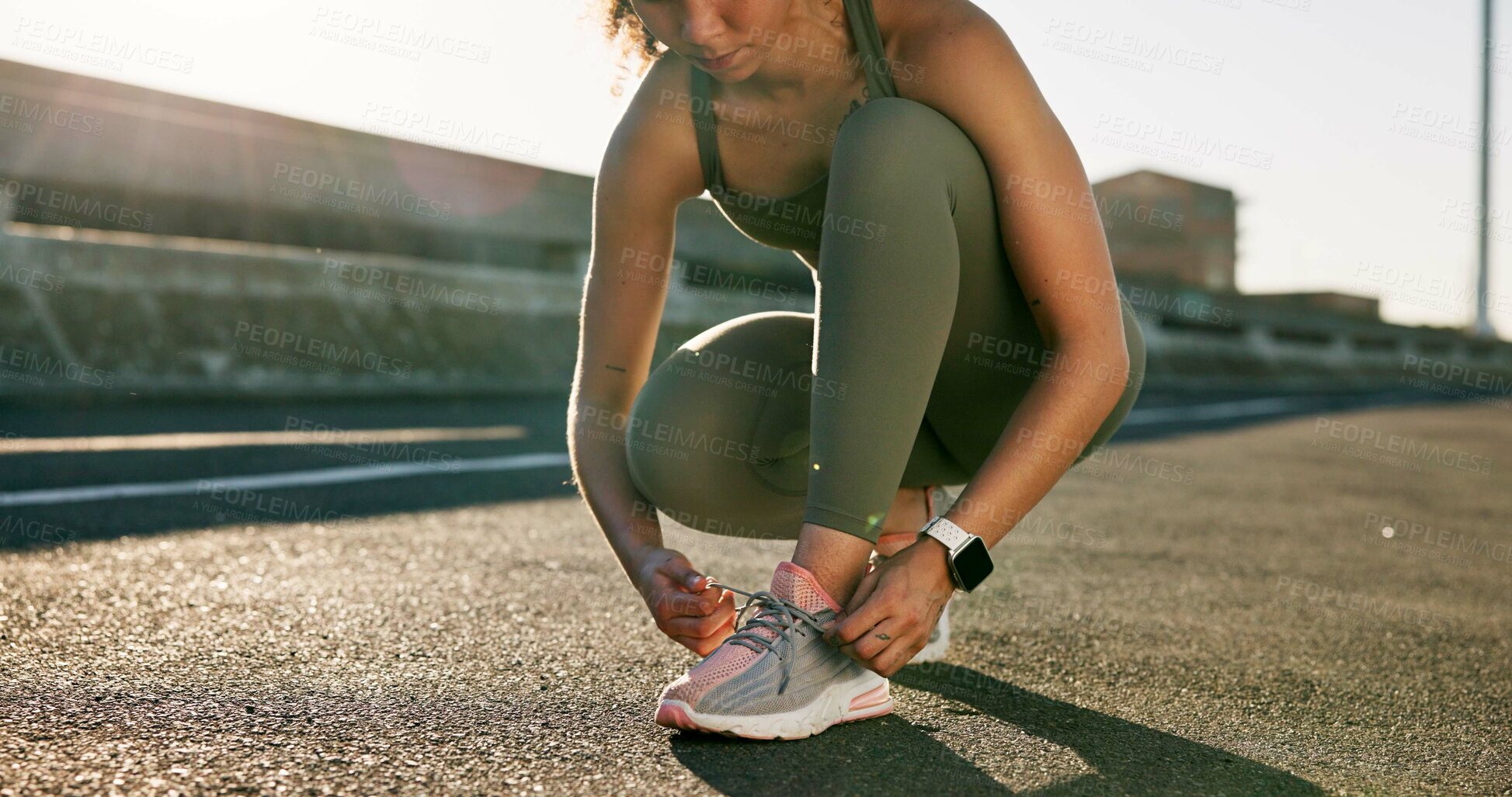 Buy stock photo Hands, sports and woman tie laces in city for running, workout or training for wellness outdoor. Athlete, fitness and female person with sneakers preparing for cardio exercise, health or active.