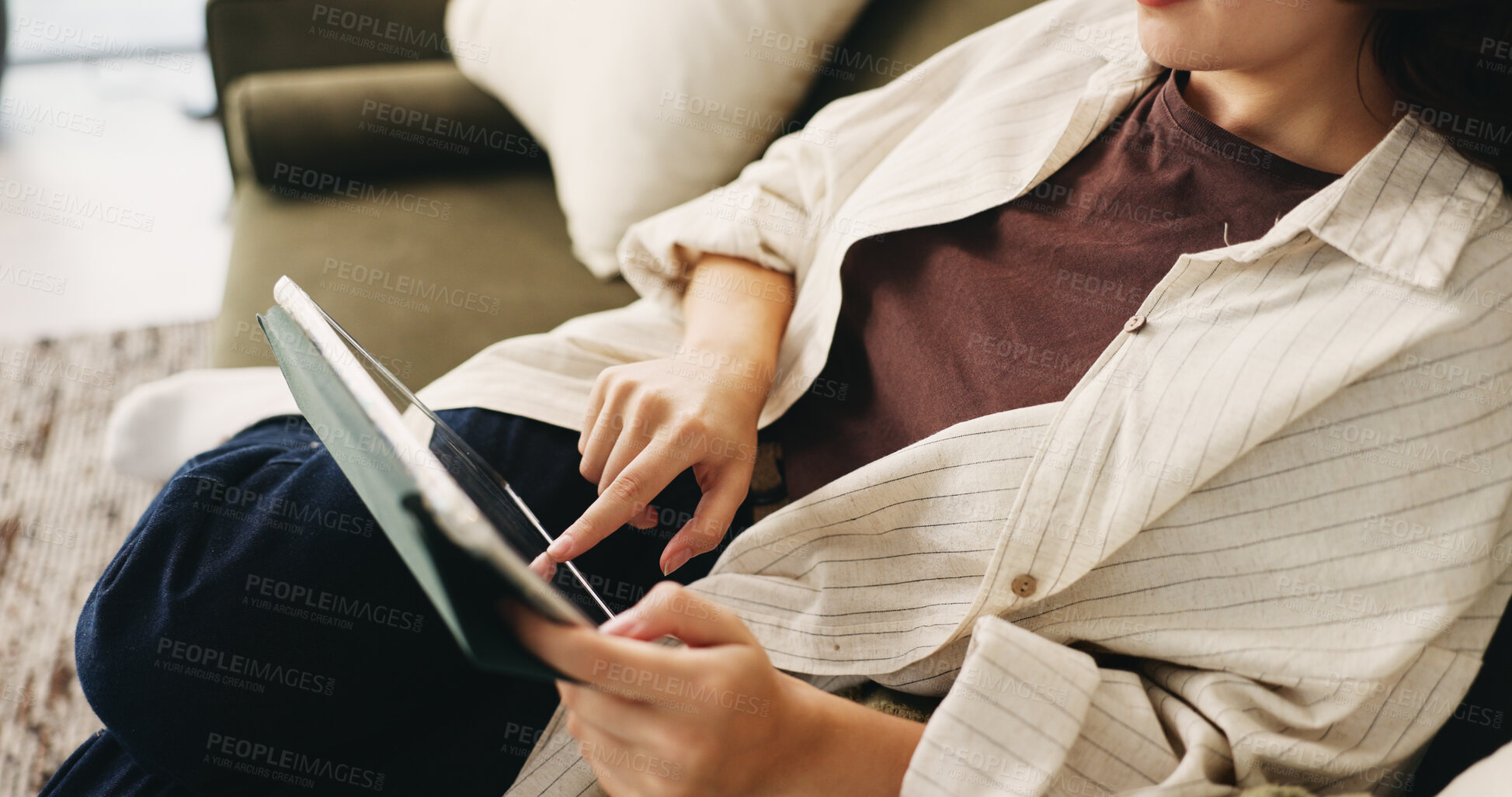 Buy stock photo Hands, relax and tablet with woman on sofa in living room to search review of streaming service. App, scrolling and sign up selection with person browsing subscription options for choice or decision
