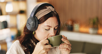 Buy stock photo Woman, headphones and coffee in home with break for drink, beverage and streaming service in lounge. Person, relax and tea cup with audio, subscription and listen to music in morning at apartment