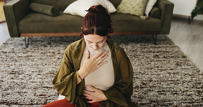 Buy stock photo Woman, meditation and chest in house with breathing exercise, wellness and zen on lounge floor. Person, yoga and pose with mudra on carpet, mindfulness or holistic fitness in living room at home