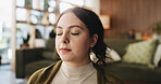 Zen, woman and peace in living room with meditation, spiritual awareness and breathing for wellness. Calm, person and mindfulness in tranquil home with reflection, holistic health and stress relief.