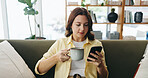 Woman, relax and coffee with phone at house for social media, browsing website and chatting. Female person, beverage or reading with mobile app for text message, communication and online notification