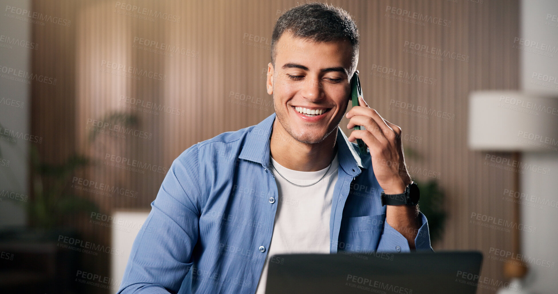 Buy stock photo Laptop, learning and phone call with man in home living room for communication or university feedback. Computer, conversation and education with happy college student in apartment for scholarship