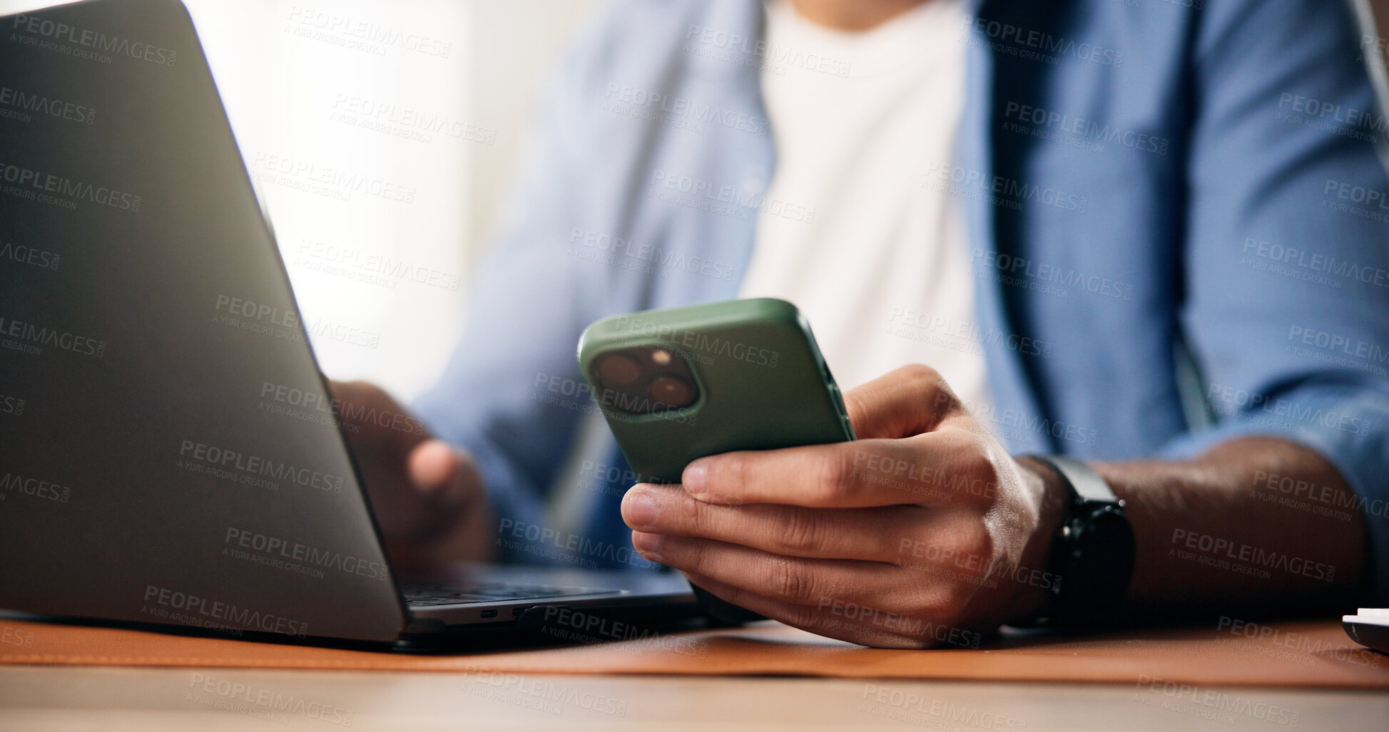 Buy stock photo Man, hands and phone in home with laptop, remote work and notification for digital marketing email. Person, tech and computer in house with online chat, browsing website and freelance advertising.