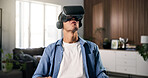 Virtual reality, smile and man on sofa for online gaming, metaverse or connection in home. Happy, person and living room with VR headset for augmented user experience, simulation or entertainment