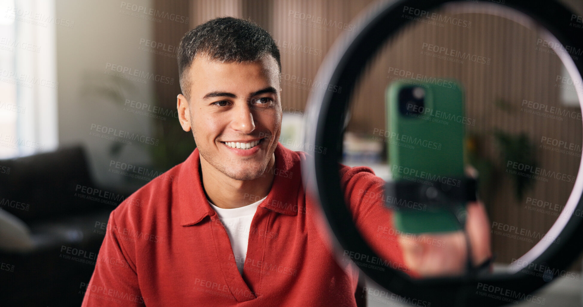 Buy stock photo Man, streamer and phone with ring light in home for content creation, influencer and recording video. Person, smartphone and influence with smile, mobile app and social network post at apartment
