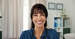 Smile, pride and portrait of doctor in office at hospital with confidence in medical career. Happy, professional and mature woman or healthcare worker with positive attitude in medicare clinic