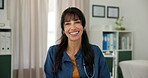 Happy, pride and portrait of doctor in office at hospital with confidence in medical career. Smile, professional and mature woman or healthcare worker with positive attitude in medicare clinic