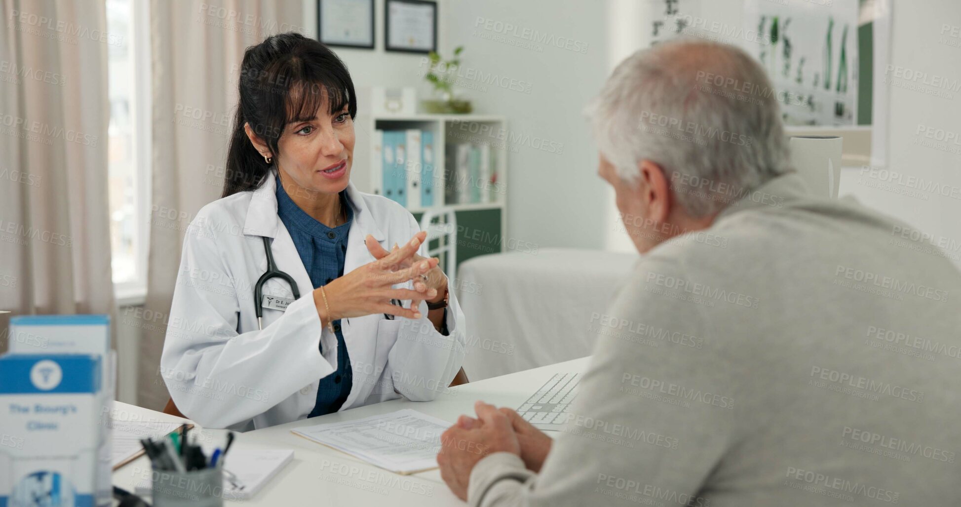 Buy stock photo Doctor, woman and talking to old man in hospital for health advice, treatment progress or planning. Clinic, senior patient and mature professional with feedback for healthcare, checkup and diagnosis
