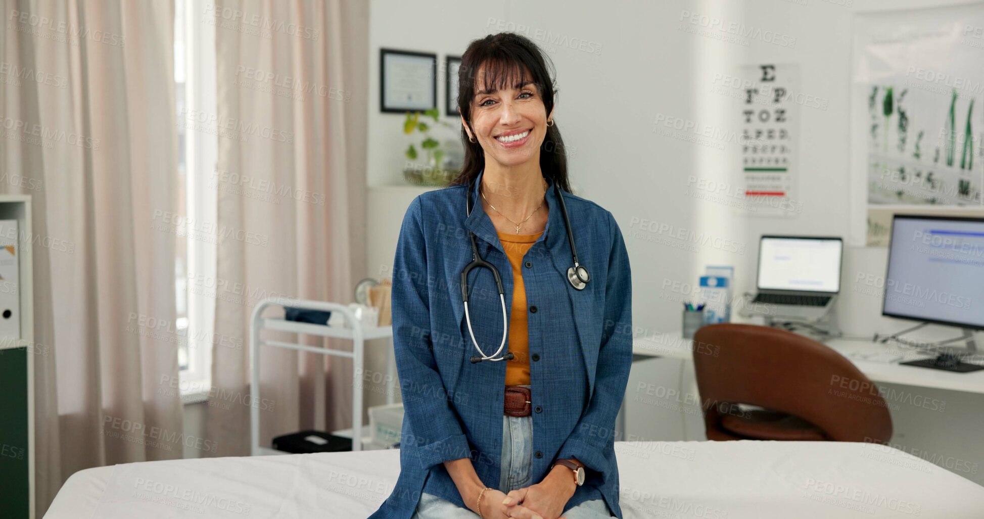 Buy stock photo Doctor, portrait and woman with smile in hospital, wellness and pride for health career or services. Clinic, medical professional and mature person with healthcare job, confident and happy in USA