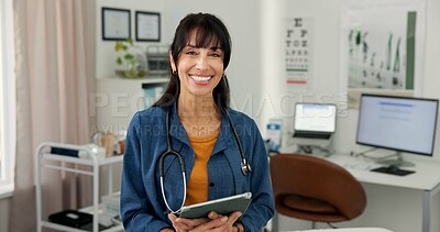 Buy stock photo Doctor, portrait and woman with tablet in hospital, wellness and pride for health career and service. Clinic, medical professional and mature person with tech for schedule, healthcare or happy in USA