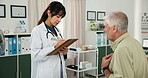 Doctor, old man or writing with clipboard in clinic, medical consultation or symptoms notes for diagnosis. Prescription, mature gp or patient with report for appointment, healthcare or follow up exam