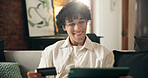 Happy man, tablet and credit card on couch in home with sale, code or choice with financial freedom. Person, tech and smile with digital banking, application and fintech for ecommerce order at house