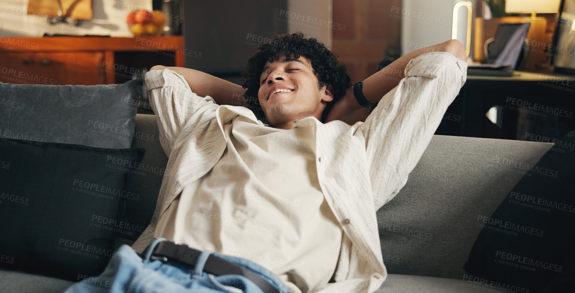 Buy stock photo Smile, stretching and man on sofa, tired in home and comfort with weekend break. Reflection, relax or happy person on couch, fatigue and posture for spine adjustment, muscle tension and stress relief