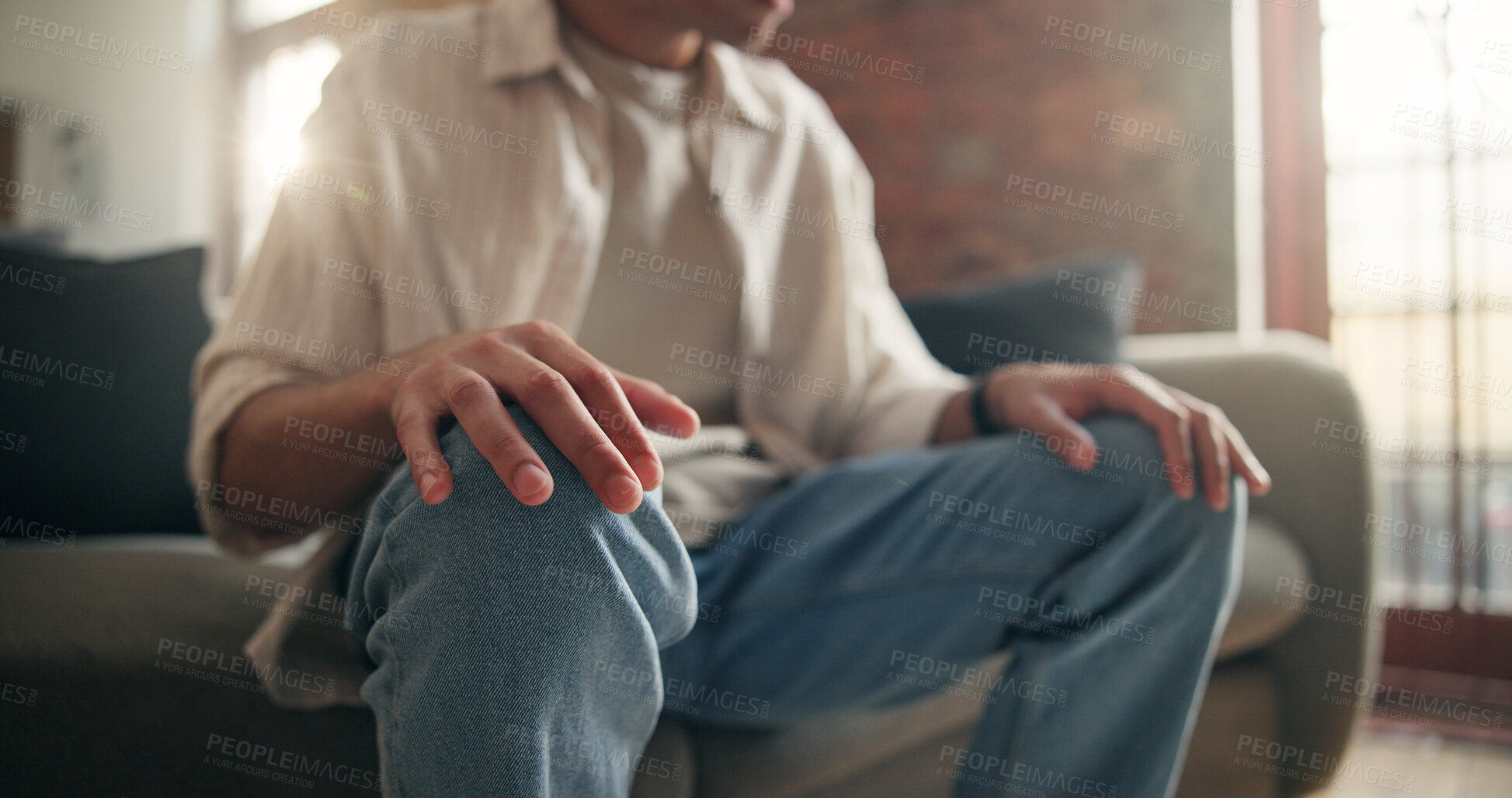 Buy stock photo Hands, anxiety and man in therapy for mental health, stress management and support on sofa. Nervous patient, counseling and consultation for psychology, rehabilitation and trauma recovery in office