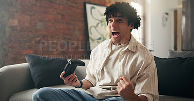 Buy stock photo Man, celebration and winner with video game on sofa in home with fist pump for next level in lounge. Person, excited and success with controller, console and virtual challenge on couch at apartment