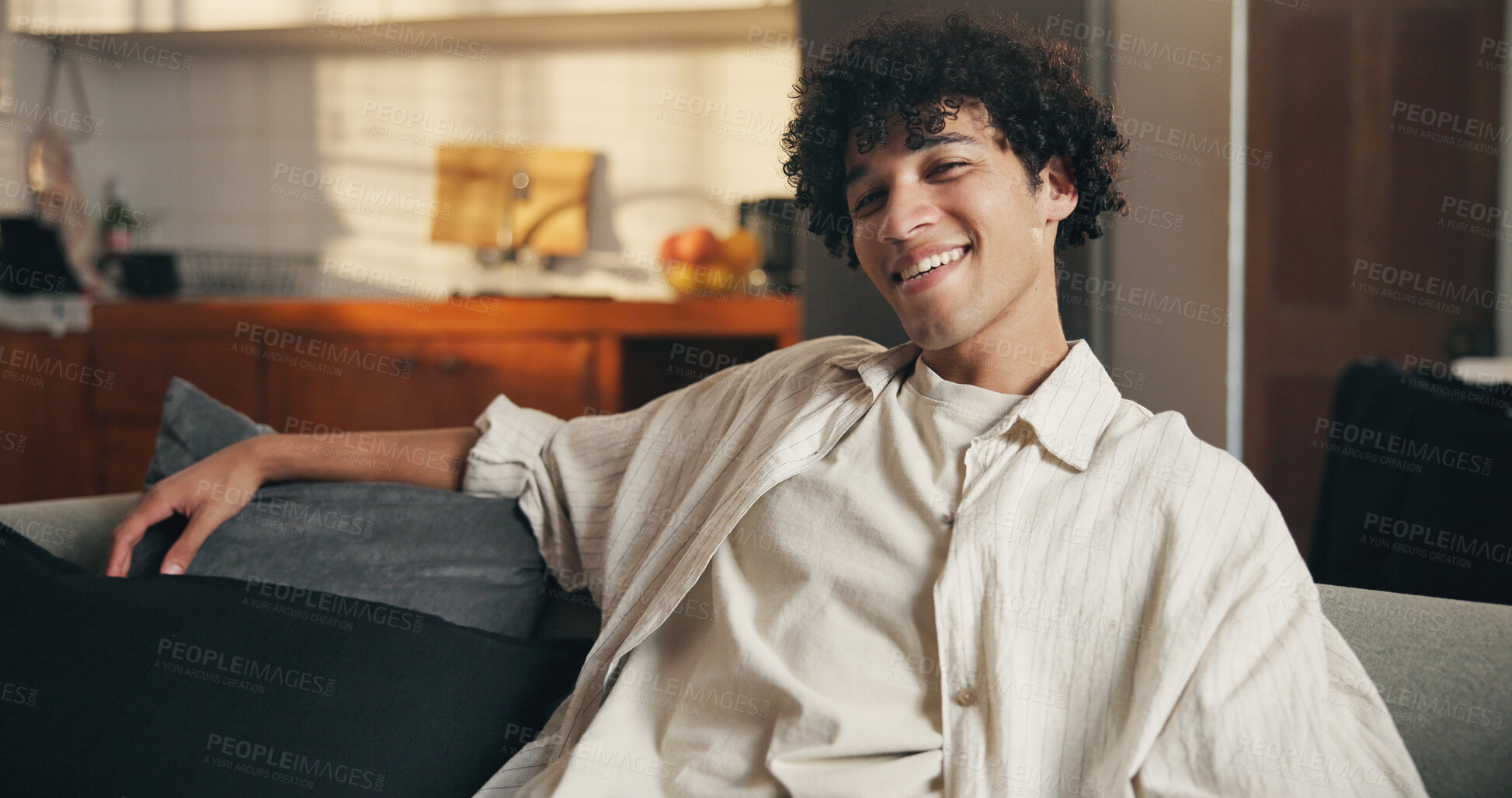 Buy stock photo Relax, portrait and man in home, smile and comfort on sofa, confidence and weekend break in lounge. Happiness, apartment and person on couch, pride and positive attitude with rest in living room