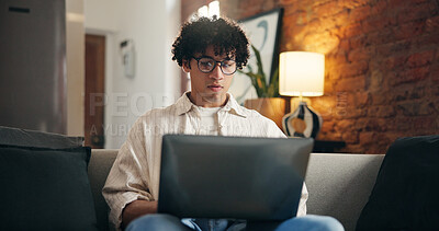 Buy stock photo Man, research and laptop in living room with remote work, website or journalist verification for story. Freelance writer, person and proofreading in home with computer, article review or online blog.
