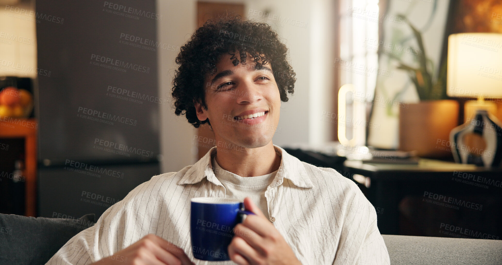 Buy stock photo Calm, thinking or man in house with coffee, memory or insight with morning inspiration. Reflection, smile or person on sofa with warm beverage, nostalgia or peaceful perspective in living room.