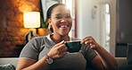Smile, woman and thinking with coffee on sofa for peace, daydreaming and calm morning. Happy, person and caffeine beverage with reflection, nostalgia memory and perspective for weekend break at house