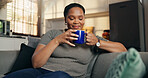 Happy, woman and smell coffee at house for peace, espresso aroma and calm morning in lounge. Smile, female person and inhale beverage for caffeine scent, enjoy fragrance and nostalgia memory on couch