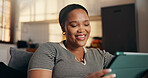 Relax, woman and smile with tablet on sofa for dating site, messaging platform and app browsing. Happy, black person and digital tech in home for streaming service, online connection or weekend break