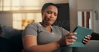 Buy stock photo Confused, social media and woman with tablet on sofa for shock, online message and chat in home. Weekend, gossip and person with tech for rumor, fake news and negative notification on mobile app
