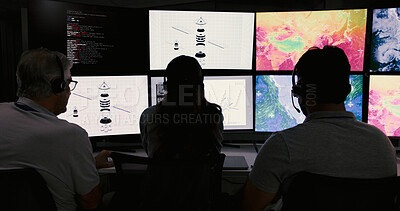 Buy stock photo Computer screen, meteorology and back of people in control room for storm, research and monitor. Weather tracking, sounding rocket and climate change surveillance with employee in office for data