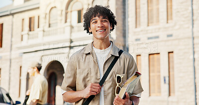 Buy stock photo Books, student and portrait of man in college for education opportunity, scholarship program and smile. University thesis, study academy and learning with person outdoor on campus for knowledge