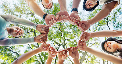 Buy stock photo Below, circle and hands with people in nature together for solidarity, support or unity. Diversity, success and trees with group of happy friends outdoor for collaboration, motivation or teamwork
