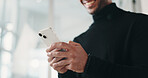 Hands, business and man with phone in office for research, browsing website and property price. Smile, male person and mobile to schedule viewing, contact client and buyer inquiry for resale auction