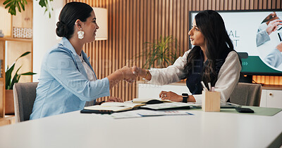 Buy stock photo Business people, meeting and boardroom with handshake for agreement to launch company project. Women, employees or colleagues shaking hands with documents for deal, b2b campaign or team partnership