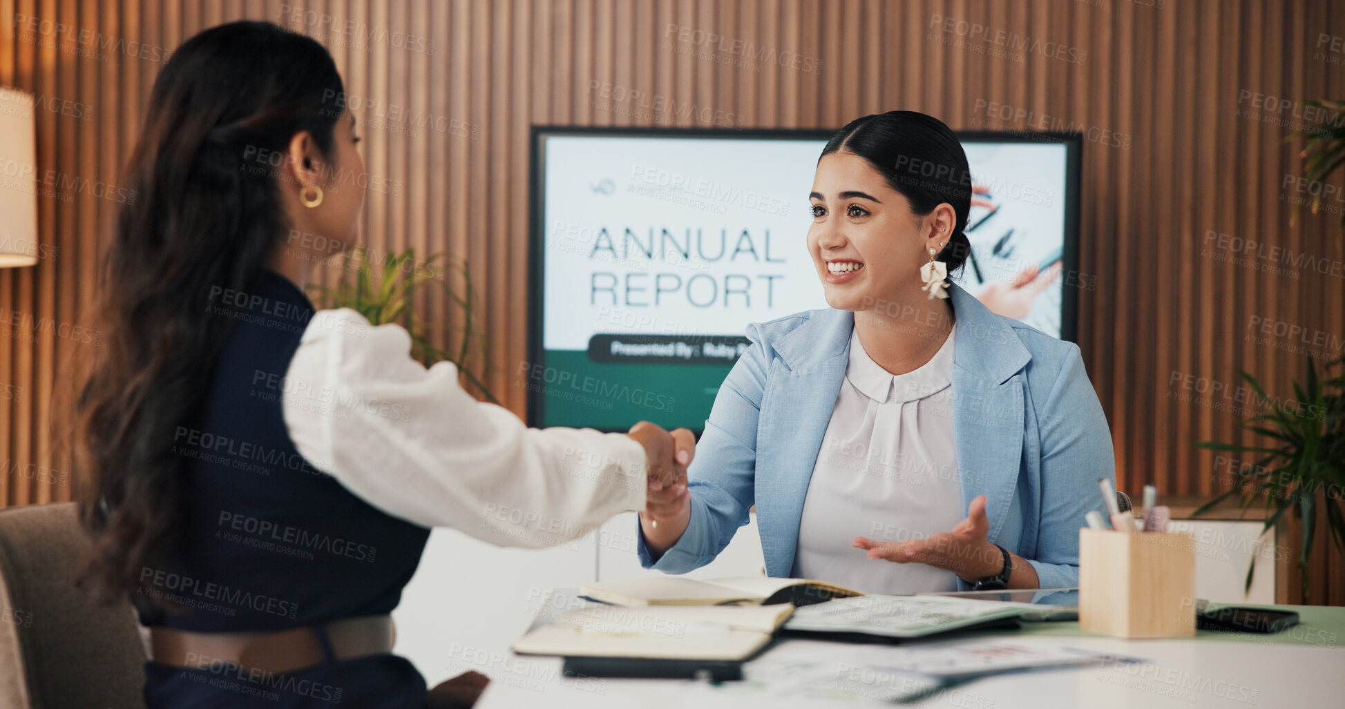Buy stock photo Women, meeting and agreement with handshake for business merger, partnership or annual report. Female people, employees or colleagues shaking hands with documents for company deal or b2b together