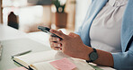 Hands, smartphone and woman in office, accountant and digital app for budget report. Closeup, person and employee in workplace, internet and cellphone for communication and research for economy info