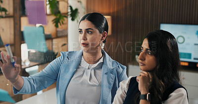 Buy stock photo Business, women or planning with glass board in office for schedule, idea or team project. Female people, thinking or colleagues with agenda, notes or reminder for brainstorming together in workplace