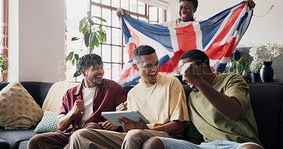 Buy stock photo Soccer game, celebration and men in home, tablet and excited for score victory. UK flag, friends and people in lounge, fans and cheering for sports tournament, live streaming or tech for match update