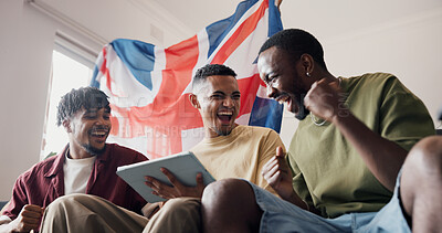 Buy stock photo Football game, home and men with tablet, celebration and fist pump for score update. UK flag, friends and people in lounge, excited or cheering for sports tournament, live streaming or tech for match