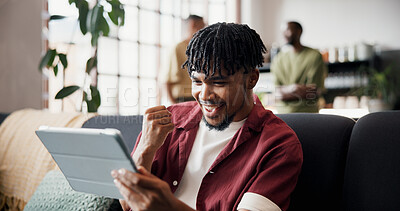 Buy stock photo Man, tablet and celebration with fist bump on sofa for streaming sport, goal or soccer match in home. Person, happy and excited with tech, app and football game on subscription at reunion for friends