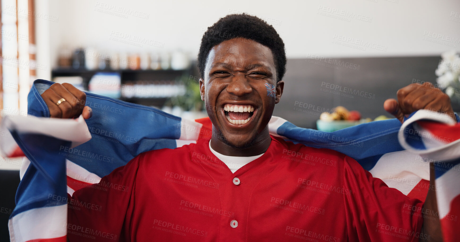 Buy stock photo Black man, portrait and celebration in home, football and cheering for champion, shouting and supporter. Fan, screaming and person in lounge, soccer and excited for score lead, UK flag or winning
