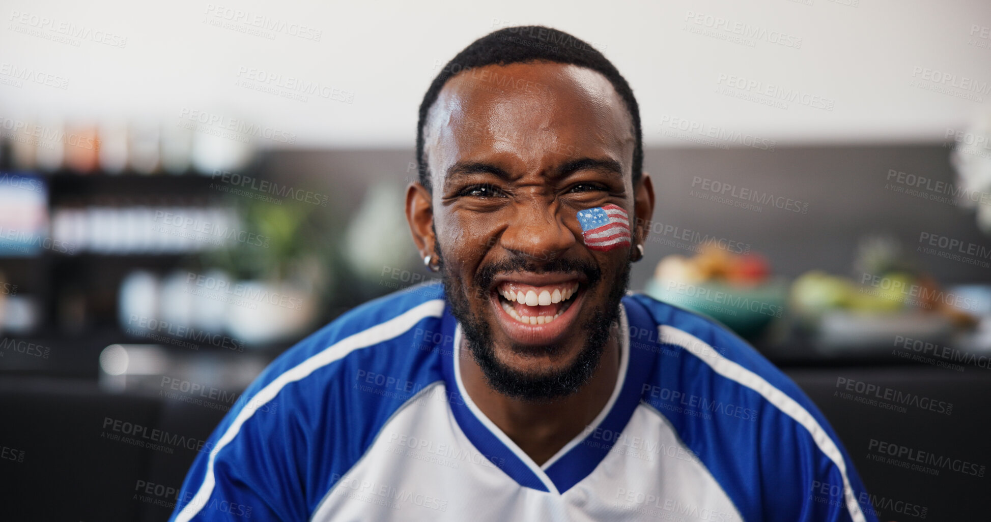 Buy stock photo Black man, excited and USA flag for soccer on couch with pride, happy and support team in home. Person, smile and portrait on sofa with face paint, streaming and global football competition at house