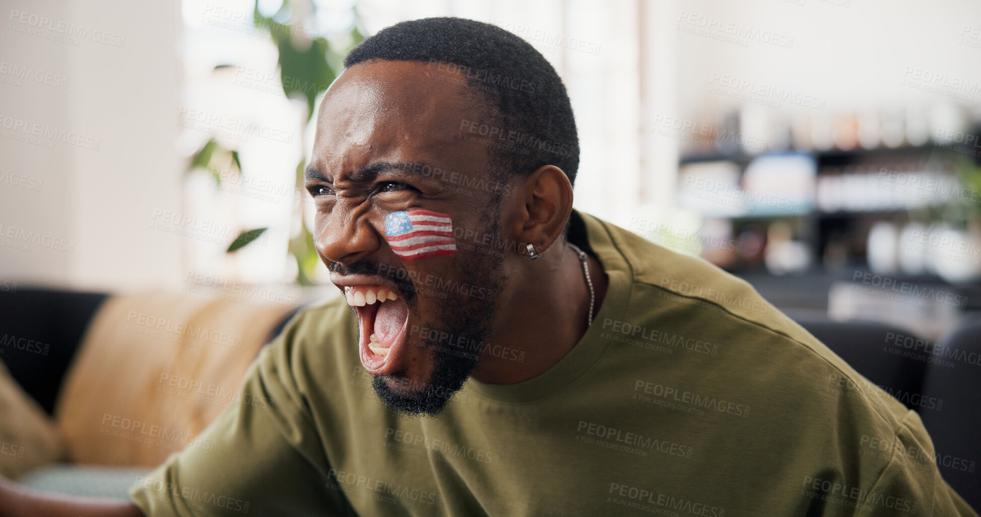 Buy stock photo Black man, celebration and USA flag on sofa with face paint, cheers and goals in global soccer competition. Person, happy and excited with success, winning or watching tv for football at apartment
