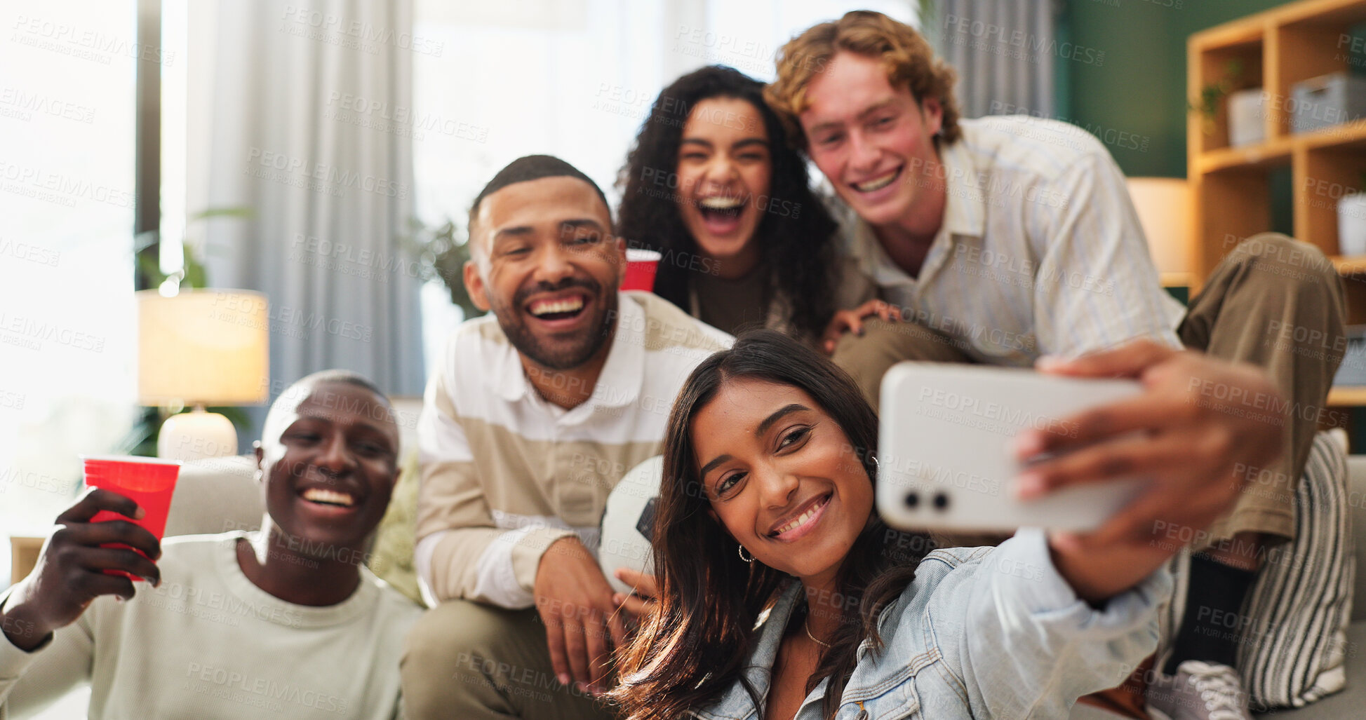 Buy stock photo Happy people, friends and memory with selfie in home for live soccer game, match or social together. Excited, group or sport fans with smile for photography, picture or fun entertainment in house