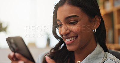Buy stock photo Happy woman, reading and chatting with phone in home for social media, gossip or conversation. Female person, user or smile with mobile smartphone for online texting, network service or communication