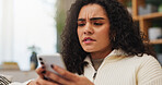 Confused, upset and woman with cellphone in home for texting, networking or communication on mobile app. Technology, bad news and female person with phone for contact or chatting in living room.