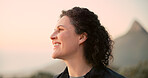 Hiking, nature and woman with smile for trekking, view and adventure with sunset. Travel, tourism and happy person on holiday or vacation for wellness, walking and exercise outdoors on mountain