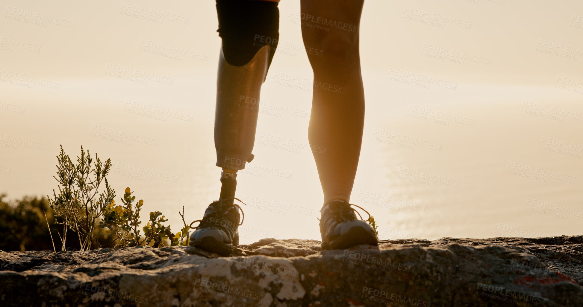 Buy stock photo Athlete, hiking and prosthetic leg on mountain for fitness, adventure and exercise for mobility. Closeup, cliff and person with disability for trekking, physical challenge and rehabilitation training