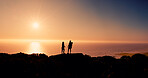 Hiking, sunrise and people on mountain by ocean with prosthetic leg for adventure, trekking and exercise. Nature, space and silhouette of friends in morning for fresh air, wellness and workout