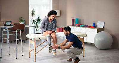 Buy stock photo Physiotherapist, amputee and leg with people, consultation and rehabilitation for person with disability. Healthcare, help or appointment for medical prosthetic, physical therapy or man with woman