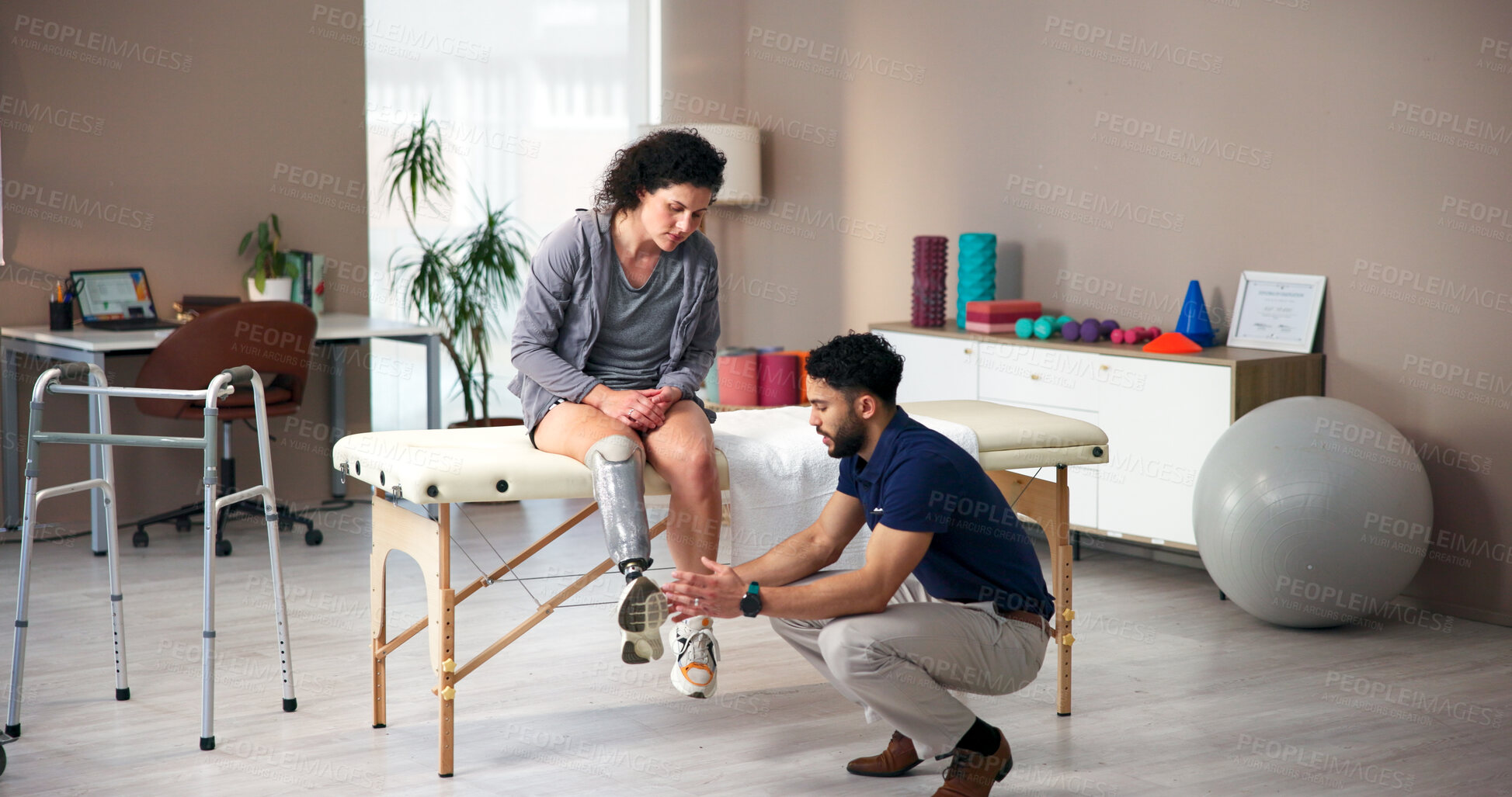 Buy stock photo Physiotherapist, amputee and leg with people, consultation and rehabilitation for person with disability. Healthcare, help or appointment for medical prosthetic, physical therapy or man with woman