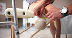 Physiotherapy, measurement and person with amputation in clinic for prosthetic leg, support and consulting. Healthcare, measure and physical therapist with patient with disability for artificial limb